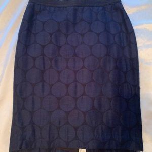 Brocade fabric pencil skirt with navy spheres and black background